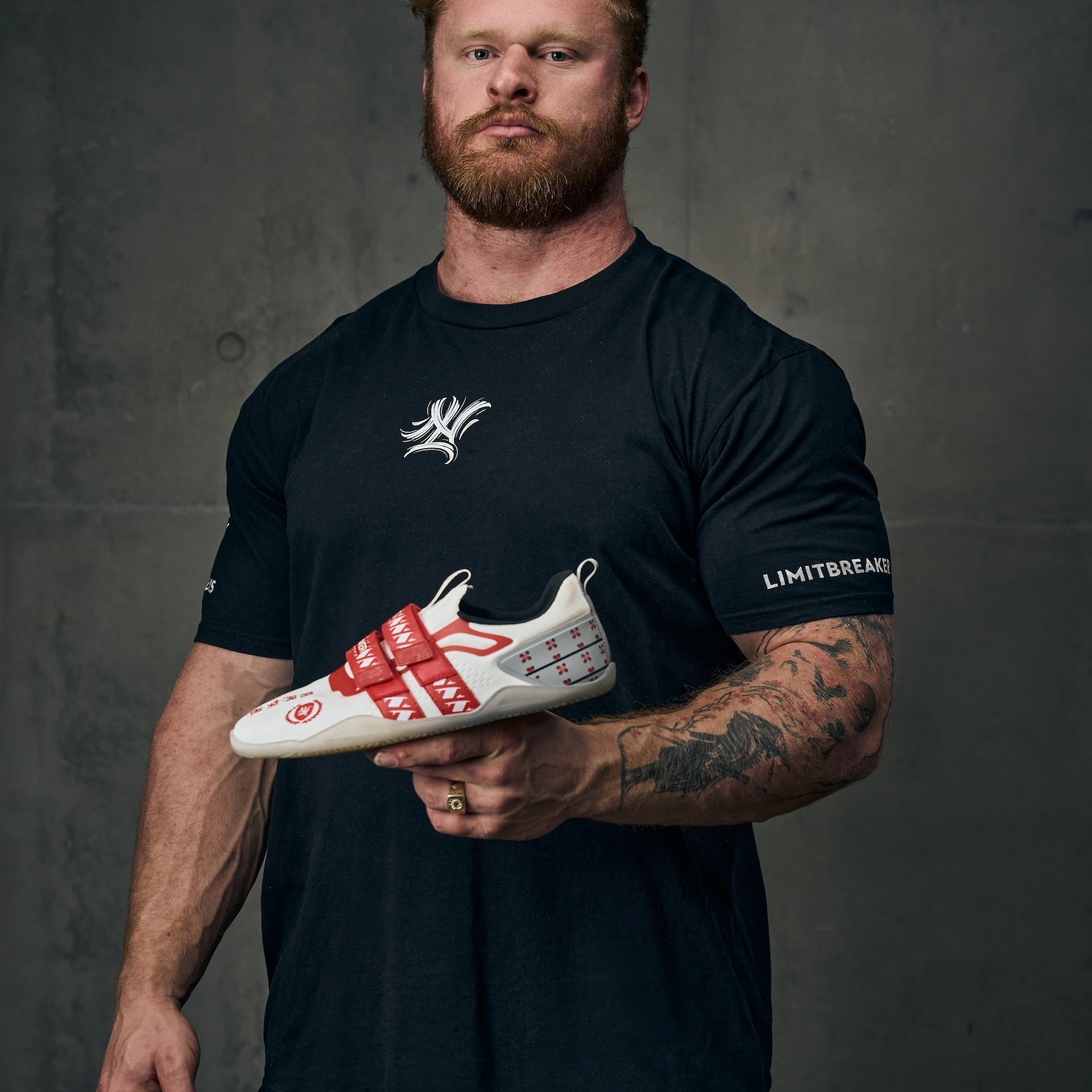 Colton Engelbrecht holding the white and red Sumo Sole Gen 5 Limit Breaker V2